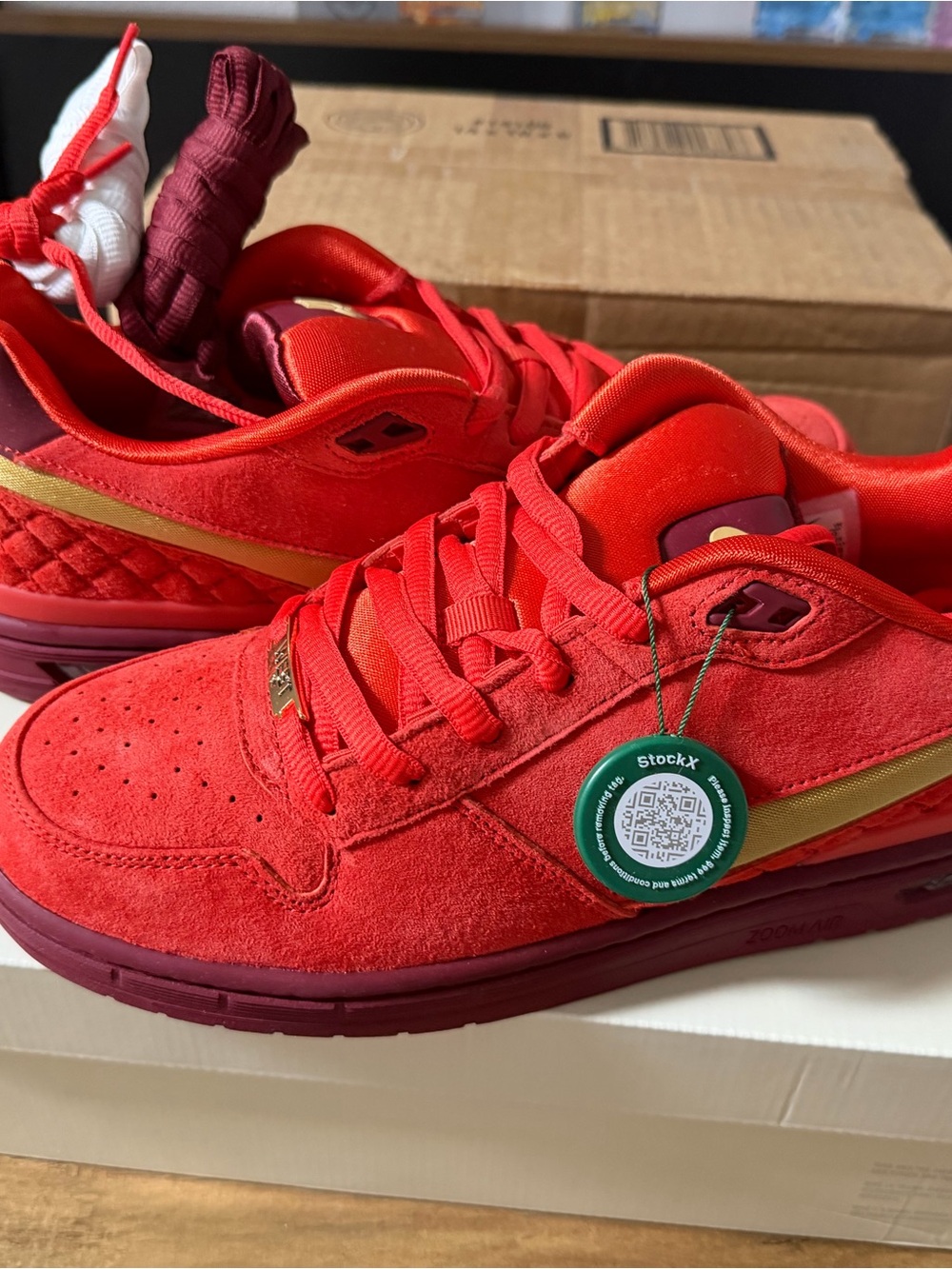 Nike Kids Red Suede Sneakers with Gold Stripe